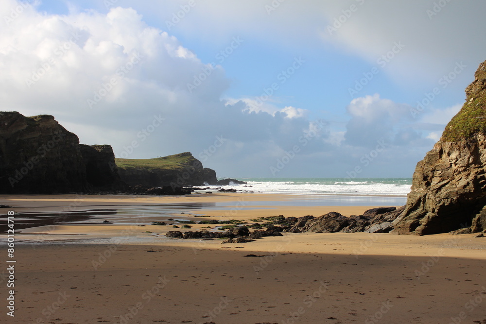 Coastal scene with beach and rocks