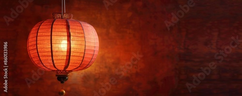 Red Chinese lantern in a traditional setting, creating a warm and cozy ambiance against a rich, textured background.