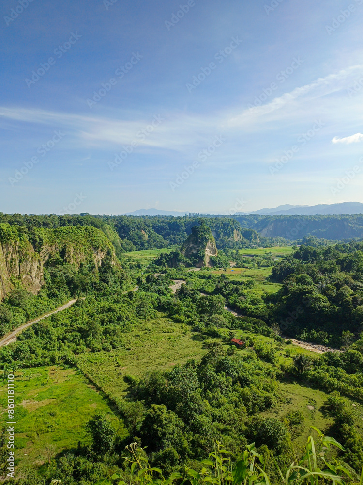 expanse of green hills and blue skies during the day, beautiful views from the top of the name Puncak Taruko Bukittinggi, Indonesia expanse of green hills and blue skies during the day, beautiful views from the top of the name Puncak Taruko Bukittinggi, Indonesia