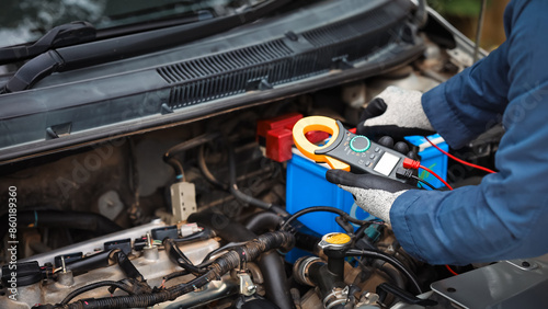 Wallpaper Mural Car care and service A technician is troubleshooting an engine. Spare parts of car engines that have problems and support car insurance services, standard car repair service center concepts. Torontodigital.ca