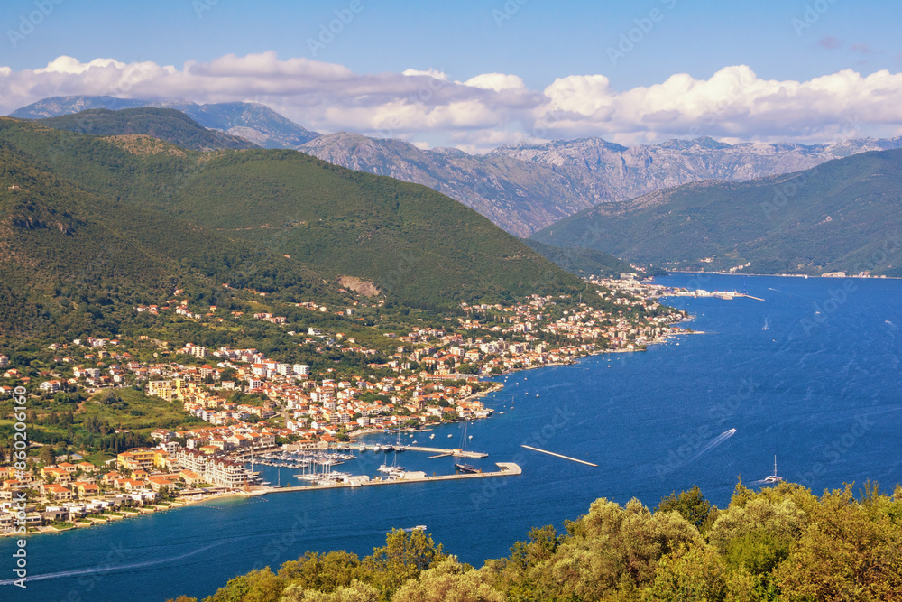 Beautiful summer Mediterranean landscape. Montenegro, view of Bay of Kotor from Lustica peninsula. Kumbor, small town in municipality of Herceg Novi Beautiful summer Mediterranean landscape. Montenegro, view of Bay of Kotor from Lustica peninsula. Kumbor, small town in municipality of Herceg Novi