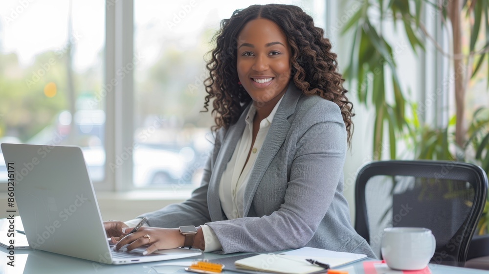 The smiling businesswoman at desk The smiling businesswoman at desk