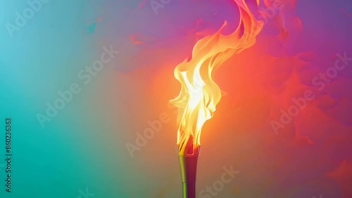 Vibrant torch flame burns against gradient rainbow background. Summer Olympic game fire symbol concept. Vivid colors. Inspiration, hope, and passion. Emblem of sport competition.