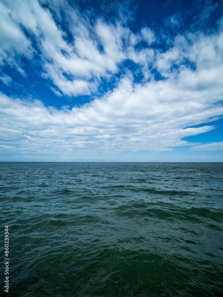 Obraz premium Landscape beautiful summer vertical horizon look view tropical shore open sea beach cloud clean and blue sky background calm nature ocean wave water nobody travel at thailand chonburi sun day time