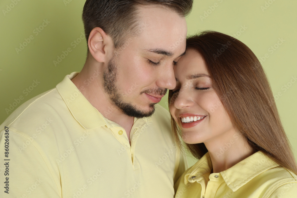Happy couple on green background. Strong relationship Happy couple on green background. Strong relationship