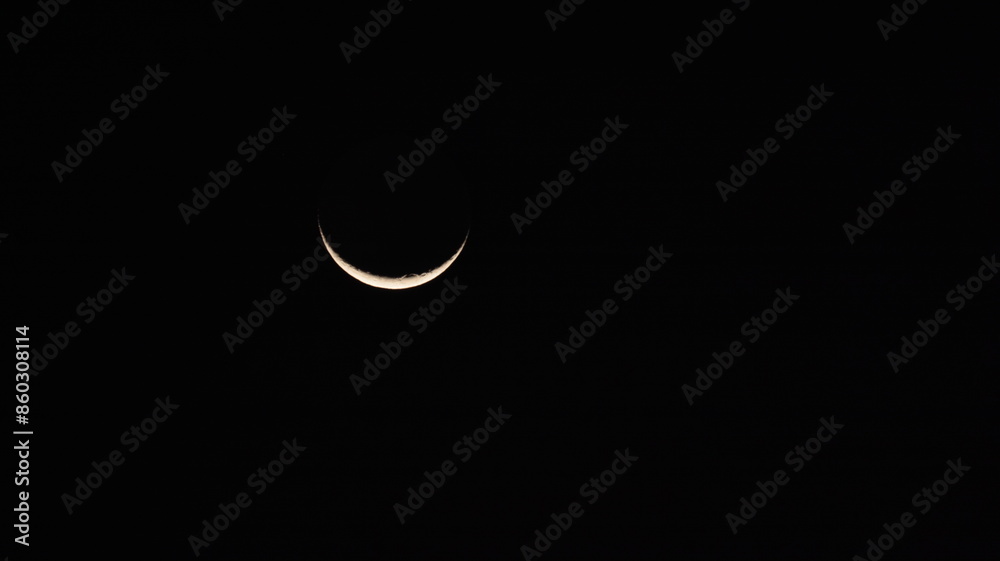 A waning crescent moon in Florianópolis, Santa Catarina, Brazil A waning crescent moon in Florianópolis, Santa Catarina, Brazil