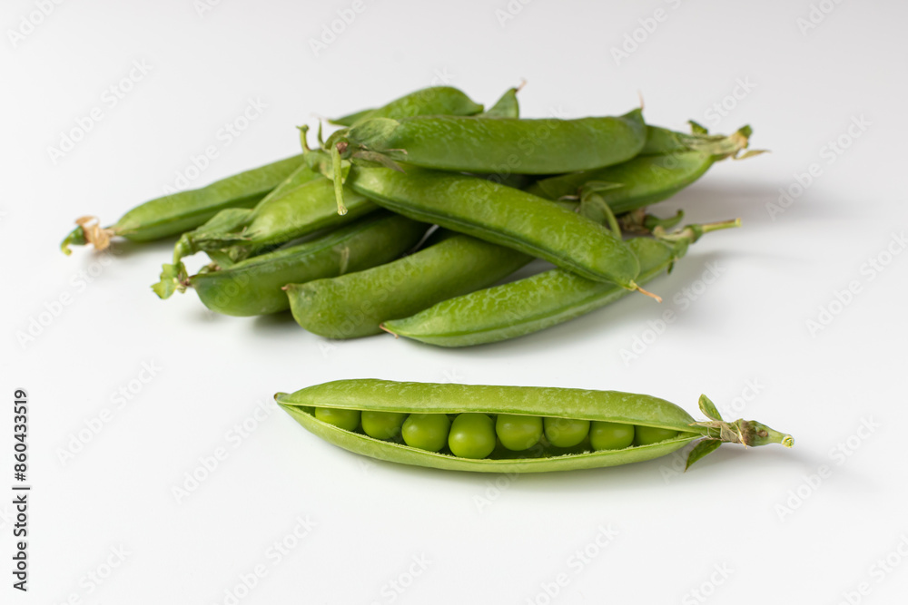 Fresh green peas isolated on a white background Fresh green peas isolated on a white background