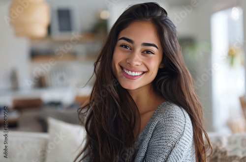 Smiling Young Woman with Long Hair.
