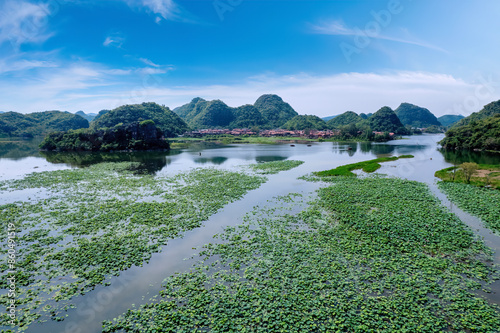 Serene Lake with Mountainous Backdrop photo