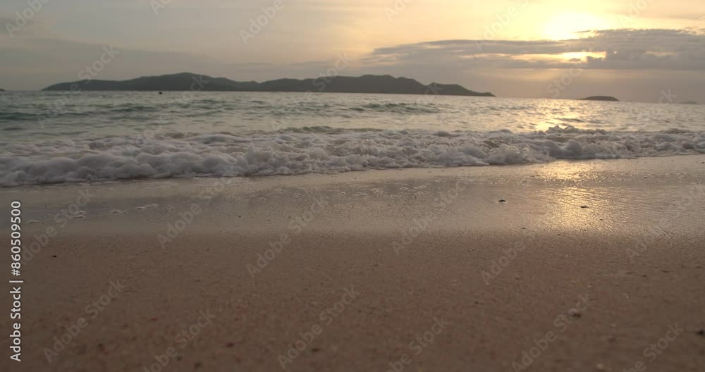 Sea waves on the beach with colorful sunset sky background in Thailand. Sea waves on the beach with colorful sunset sky background in Thailand.