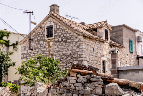 Obraz na płótnie Strolling through the streets of the decaying village of Zirje on the island of the same name in Croatia w salonie