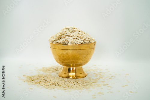 A Copper Bowl Filled with beaten Rice Flakes aka Chiura Chiuda for Paddy Plantation Day Asaar 15 Dahi Chiura Celebration in Nepal photo