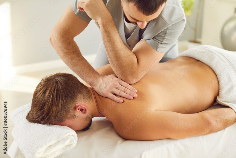 Back torso massage, manual therapy rehabilitation, physical therapist doing manipulative therapy. Relax or reduce pain, relieve tension, body health, wellness, therapeutic, comfort and physical effect Back torso massage, manual therapy rehabilitation, physical therapist doing manipulative therapy. Relax or reduce pain, relieve tension, body health, wellness, therapeutic, comfort and physical effect
