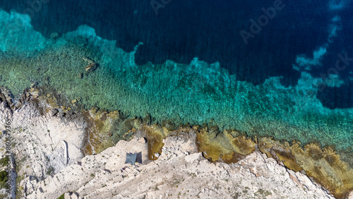 Obraz na płótnie drone view of sun sail on the Mediterranean coast of the island Zirje in Croatia w salonie