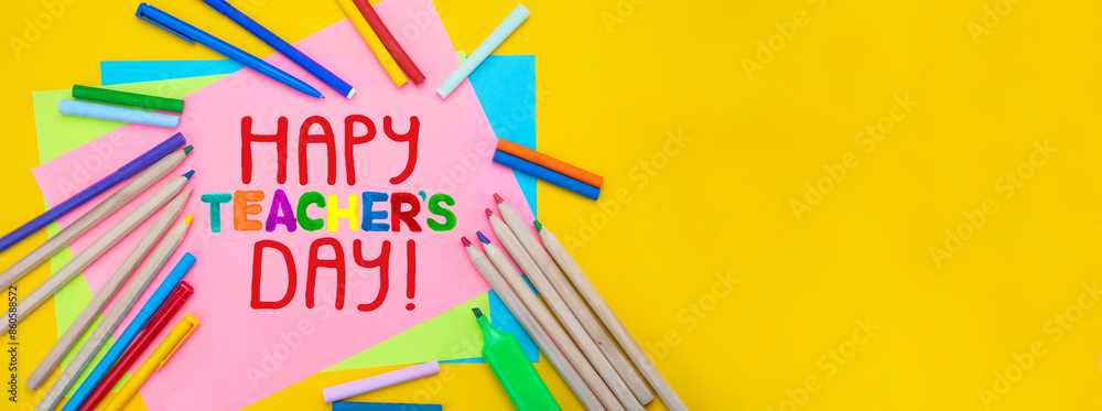 Childish lettering Happy Teachers' Day. Appreciation of teachers top view flat lay concept. Colored paper, multi-coloured letters, supplies Childish lettering Happy Teachers' Day. Appreciation of teachers top view flat lay concept. Colored paper, multi-coloured letters, supplies