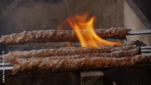 Juicy Adana Kebab Skewers Grilling Close-Up