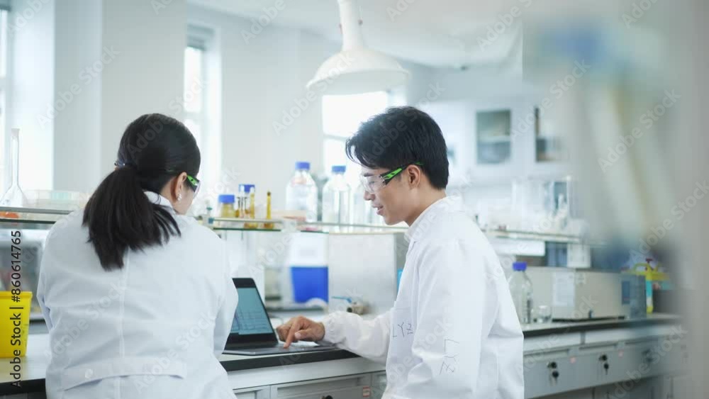 doctor coworking with tablet in lab