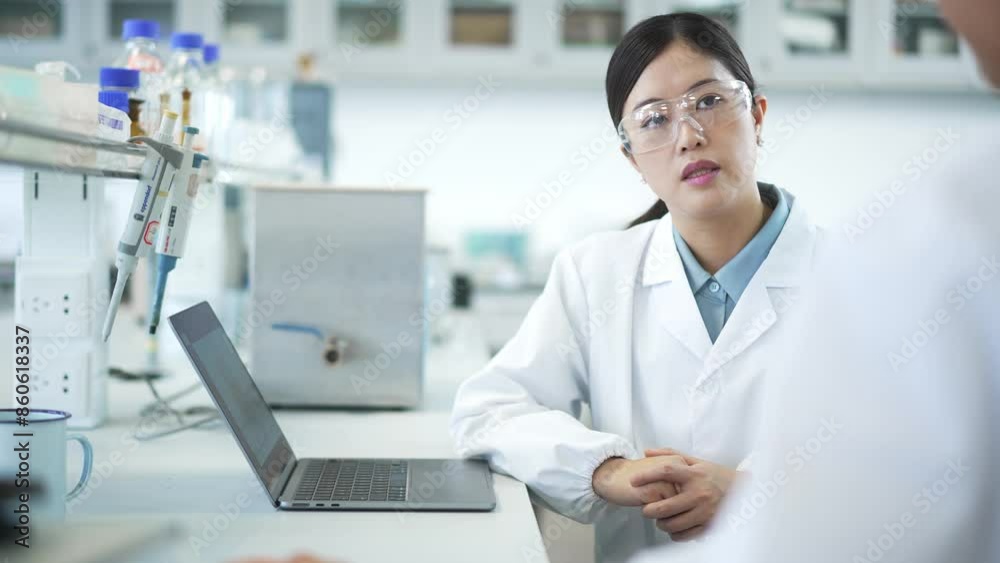 doctor coworking with tablet in lab
