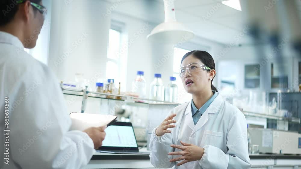 doctor coworking with tablet in lab