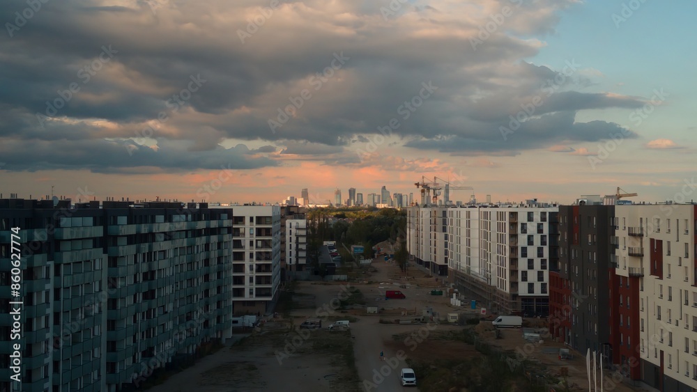 Naklejka premium New apartment blocks built on industrial estates in Ursus, Warsaw, the housing market and the growth of urban areas, migration of people to cities