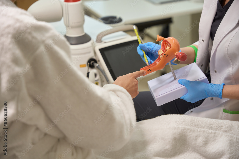 Consultation with gynecologist before procedure for treating the walls of uterus