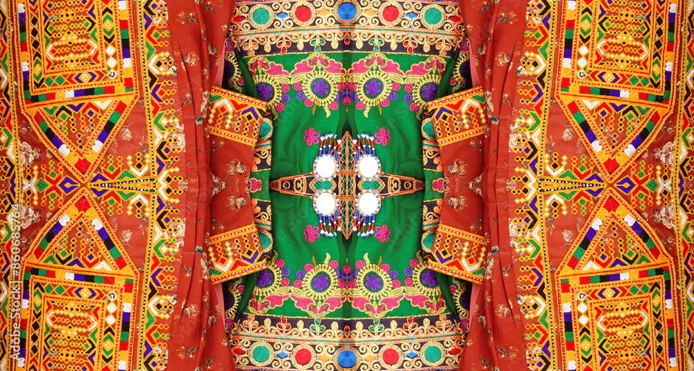 Fototapeta premium Vibrant Mirror Symmetry Traditional Indian Textiles Full Frame