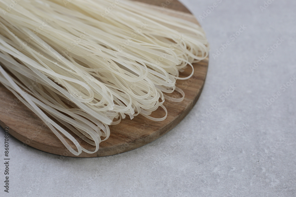Dried uncooked rice noodles. Raw rice flour noodles Dried uncooked rice noodles. Raw rice flour noodles