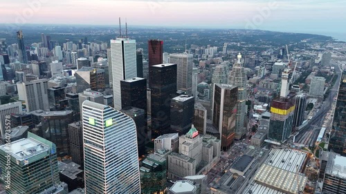 Sunset view of Toronto skyline at night with city light from skyscrapers in the financial district including TD Tower, BMO First Canadian Place, Scotia Tower photo