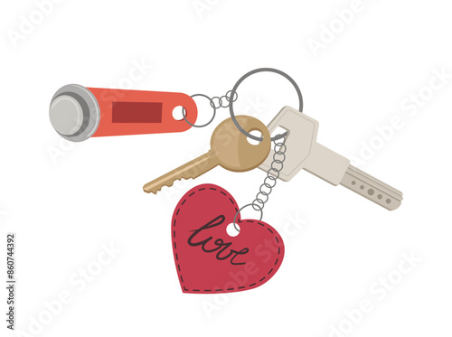 Isolated home door keys on keyholder with magnetic bibelot and cute leather love heart trinket photo