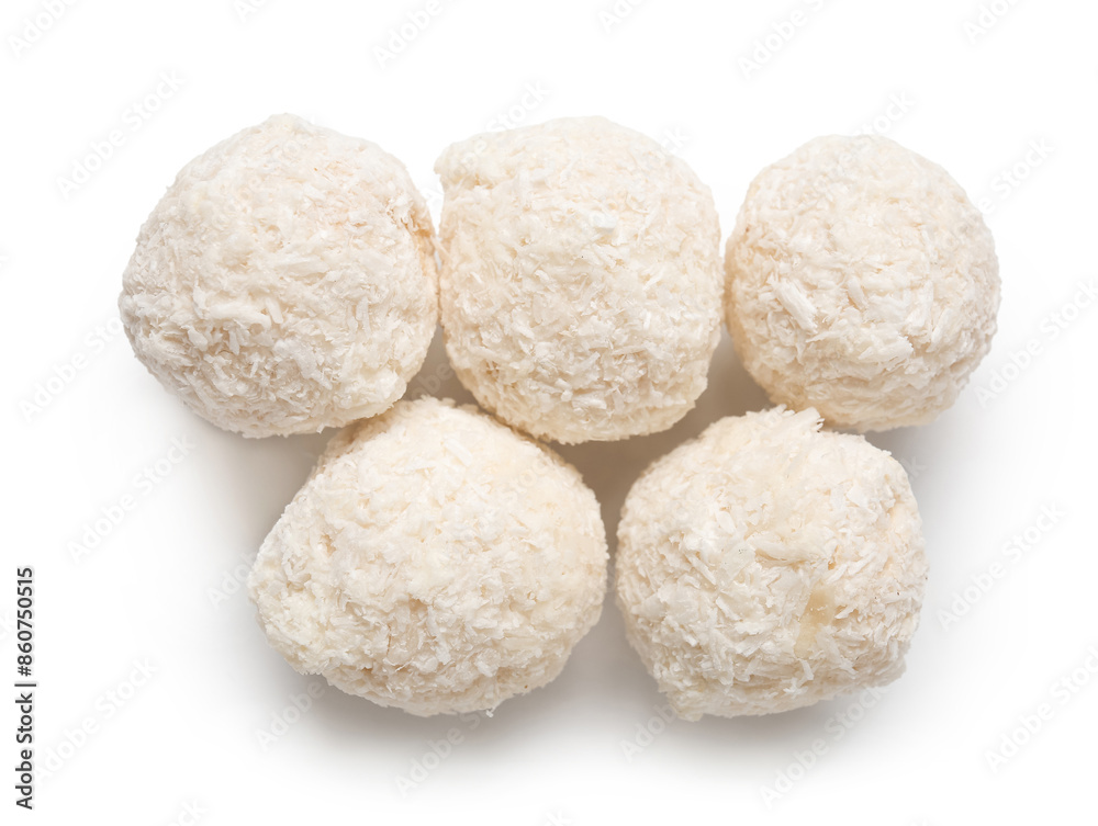 Delicious chocolate candies with coconut topping isolated on white background Delicious chocolate candies with coconut topping isolated on white background
