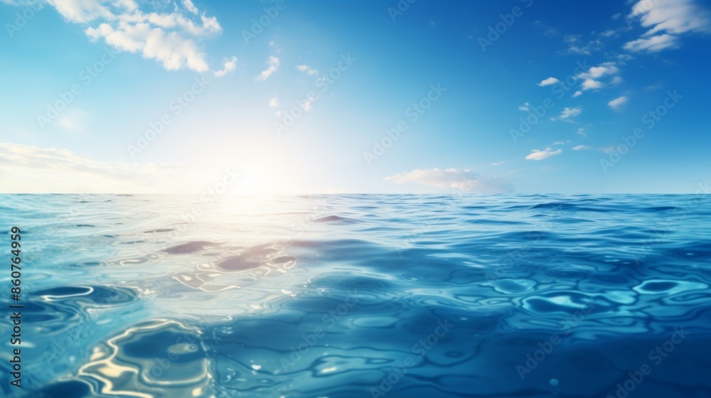 Fototapeta premium A captivating panorama of the vast ocean with glistening waves under a crystal clear sky, epitomizing the serene and majestic beauty of the expansive marine landscape.