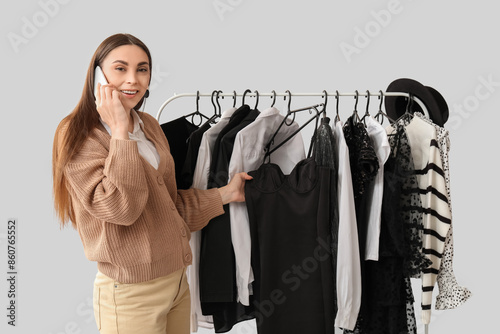 Happy female stylist with c...
