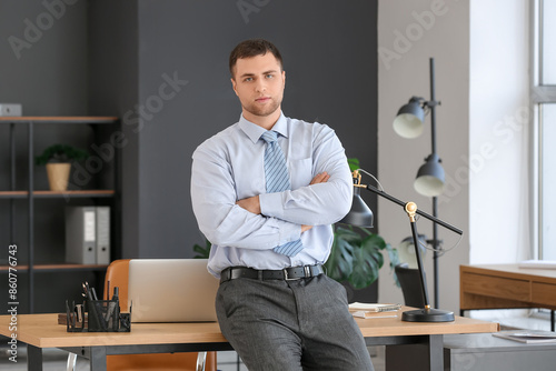 Portrait of young businessm...