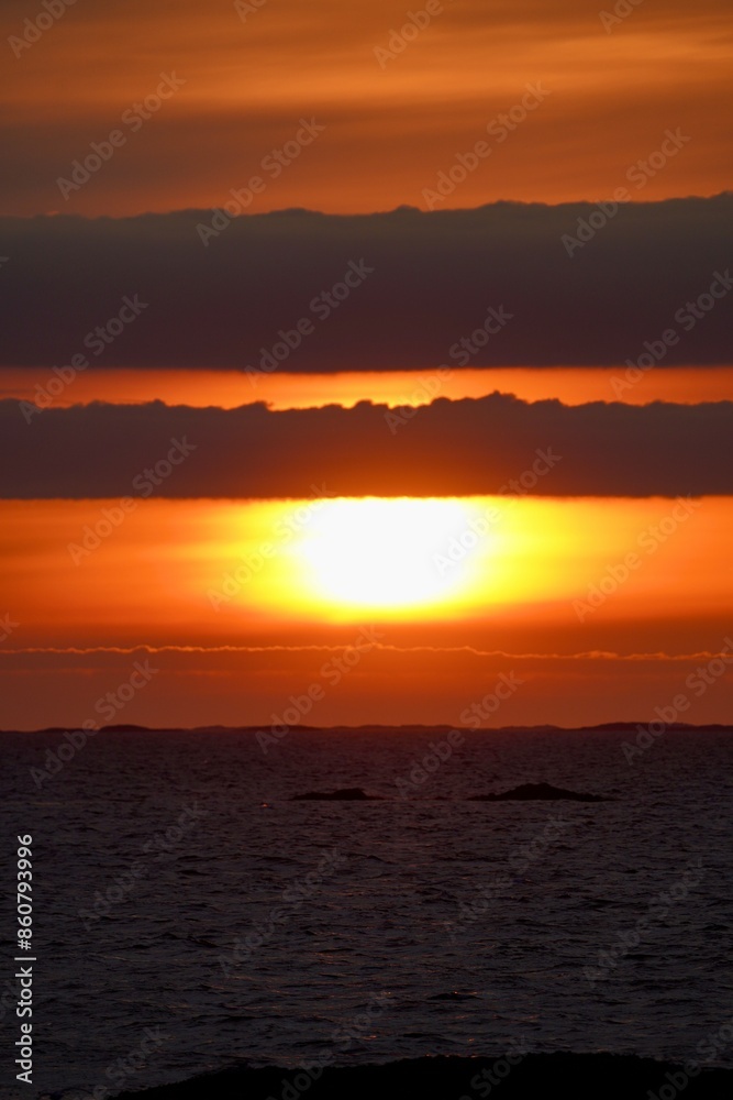 Beautiful colors are on display as sun sets over the ocean outside Kristiansund, Norway. Beautiful colors are on display as sun sets over the ocean outside Kristiansund, Norway.