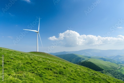 Scenic landscape with a single wind turbine on a lush green hill, under a bright blue sky with fluffy clouds, representing renewable energy.