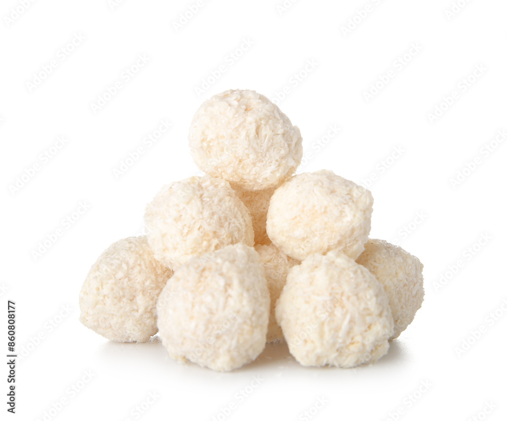 Delicious chocolate candies with coconut topping isolated on white background Delicious chocolate candies with coconut topping isolated on white background