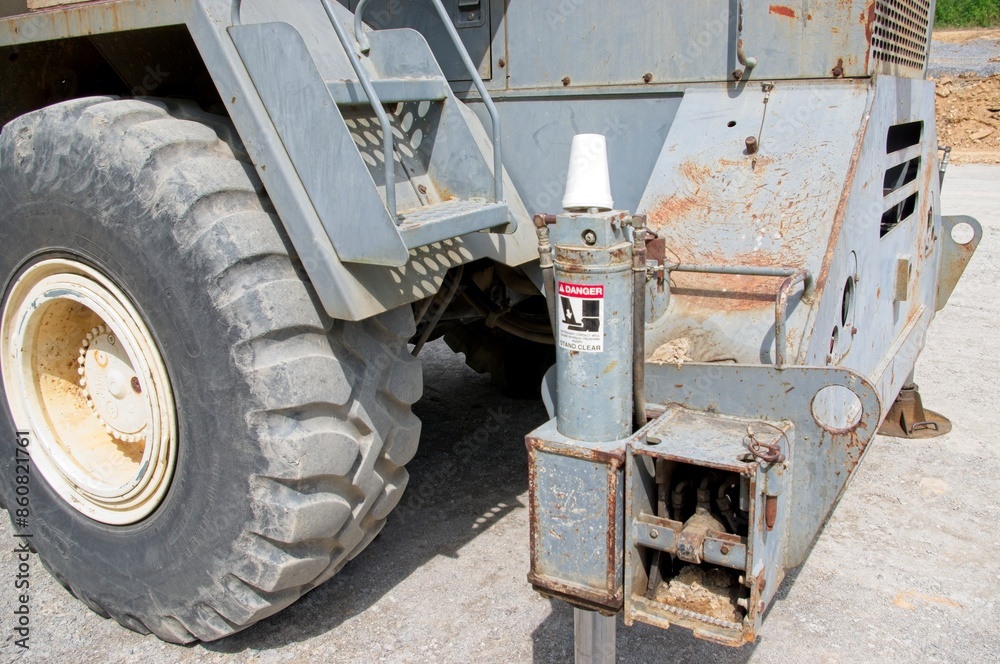 Stabilizer arm with warning for personal injury Stabilizer arm with warning for personal injury