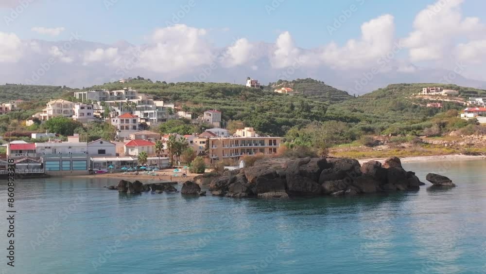Aerial drone shot.View of famous beach in the summer, Crete, Greece. Famous beach with river and palm trees in Libyan sea. Tropical island, Panoramic view, Most beautiful beaches of Crete island
