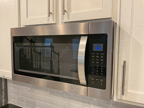 modern kitchen microwave built in to cabinet stainless steel appliance 