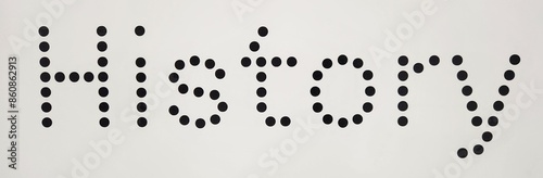History in black and white background with dots