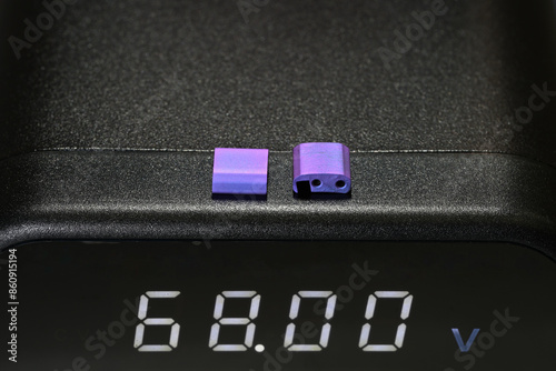 Voltage-Controlled Color Shift in Titanium Watch Parts. Repairing the anodizing of a damaged titanium watch bracelet. Anodized Titanium Watch Components.