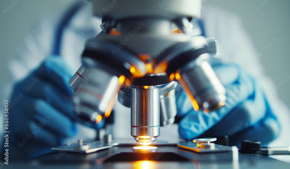 A scientist is looking through a microscope at a slide by AI generated image A scientist is looking through a microscope at a slide by AI generated image