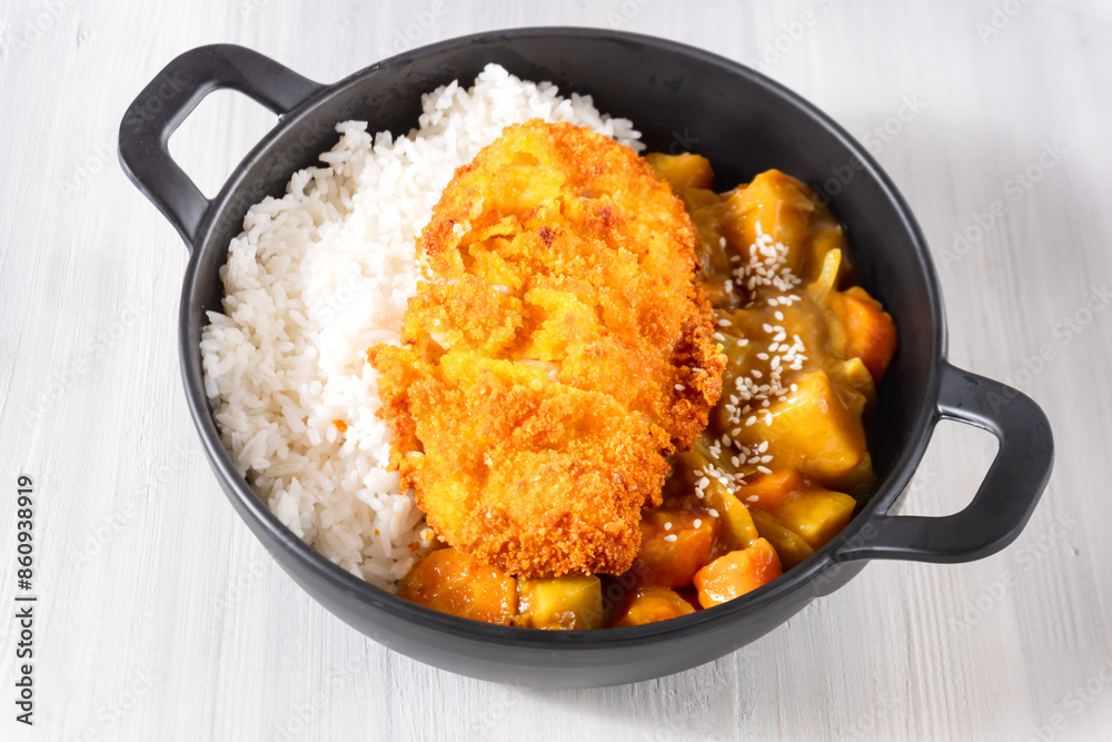 Crispy Fried Chicken with Japanese Curry and Rice - Japanese and Korean Food Style. Perfect for recipe, article, or any cooking contents. Crispy Fried Chicken with Japanese Curry and Rice - Japanese and Korean Food Style. Perfect for recipe, article, or any cooking contents.