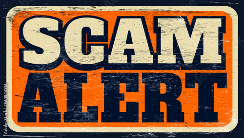 Aged and worn scam alert sign on wood