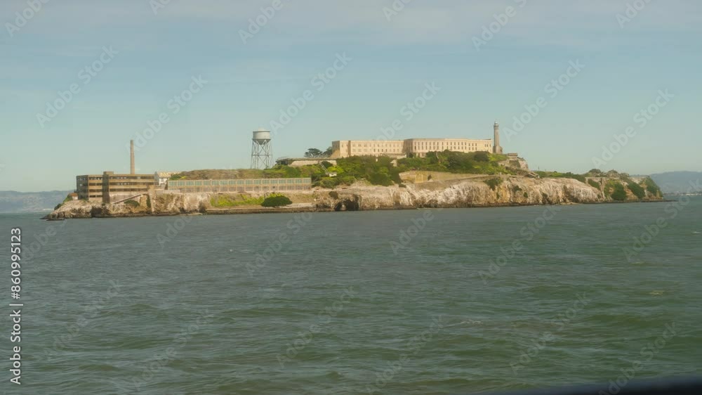 view of Alcatraz Island passing by in San Francisco view of Alcatraz Island passing by in San Francisco
