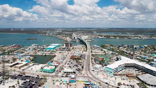 Colorful and scenic drone shot of the Fort Myers Bridge on a busy day photo