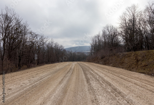 Bild auf Leinwand spring, a panorama of the mountainous area from the road leading to the forest