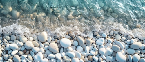 photo of a beach made of smooth stones. water, minimalism