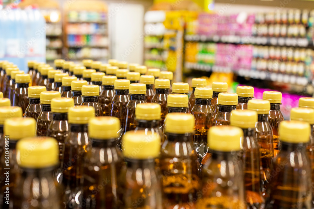 plastic containers for drinks in a supermarket. Secondary processing