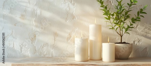 White candles on stand with...